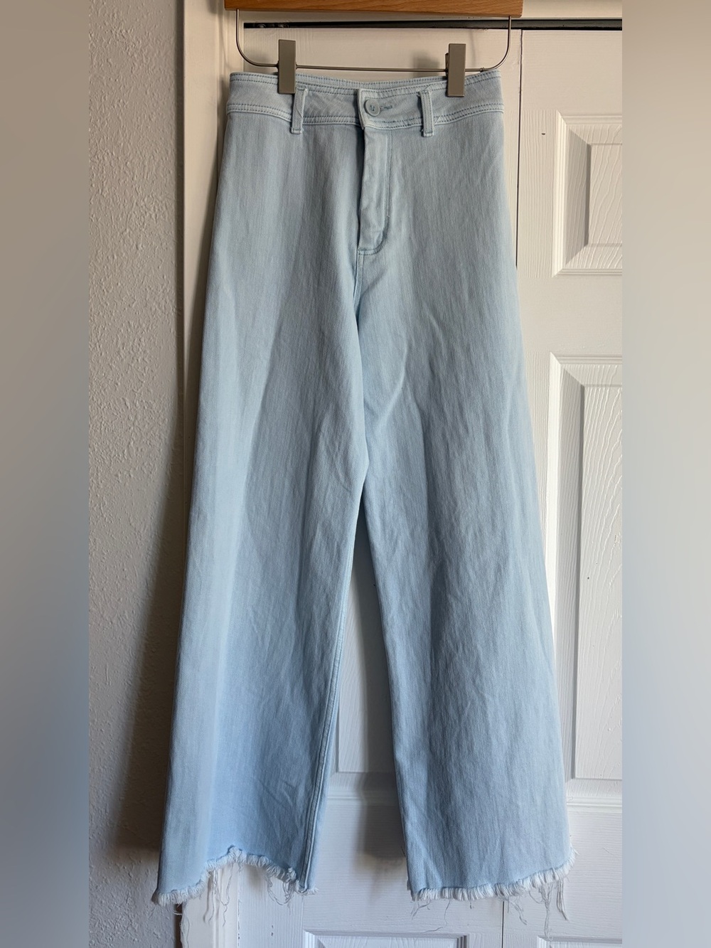 Stoned Immaculate High Waisted Light Blue Wide Flare Leg Raw Hem Jeans